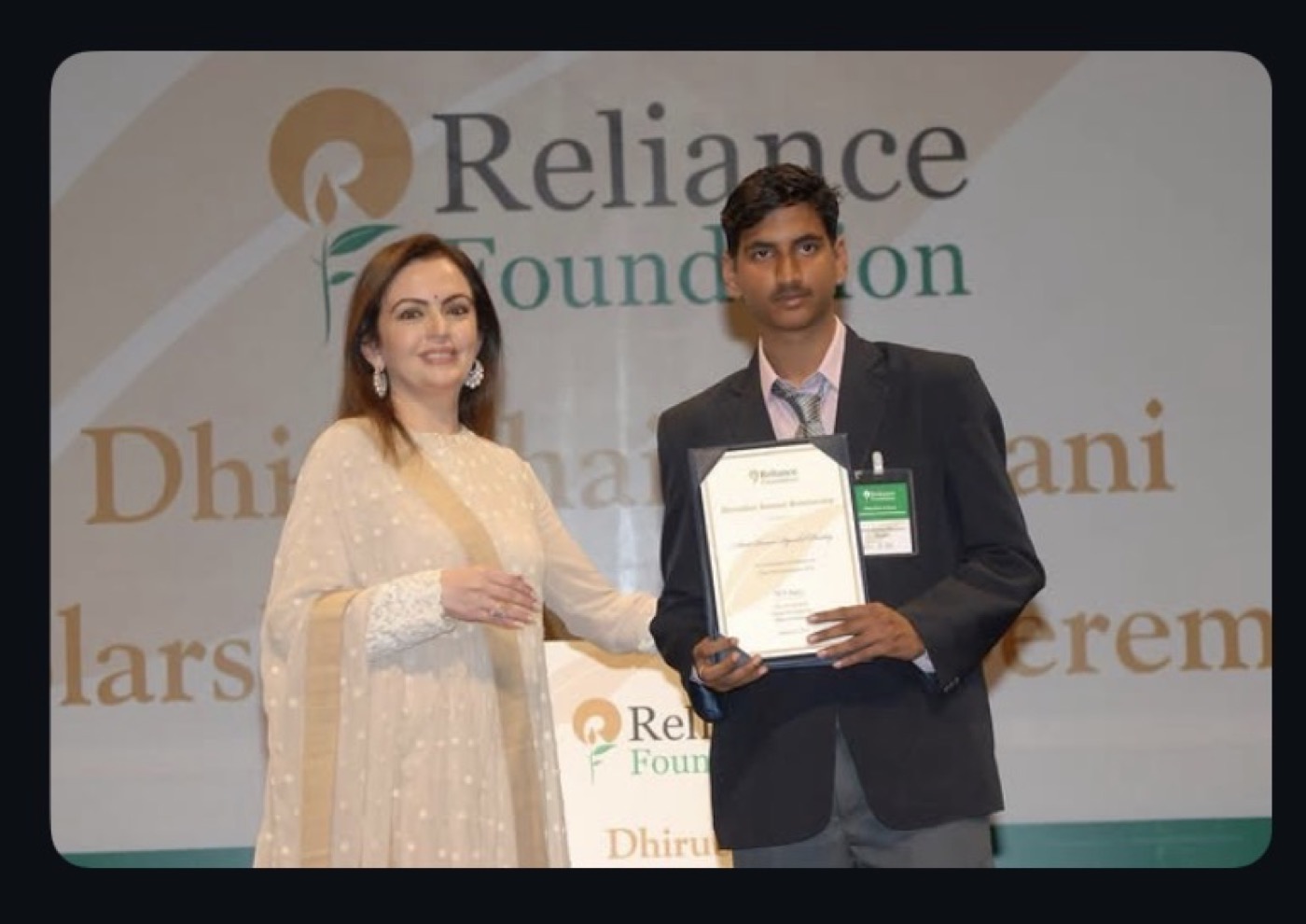 Amit Kumar Pyarelal Pandey receiving recognition at an event